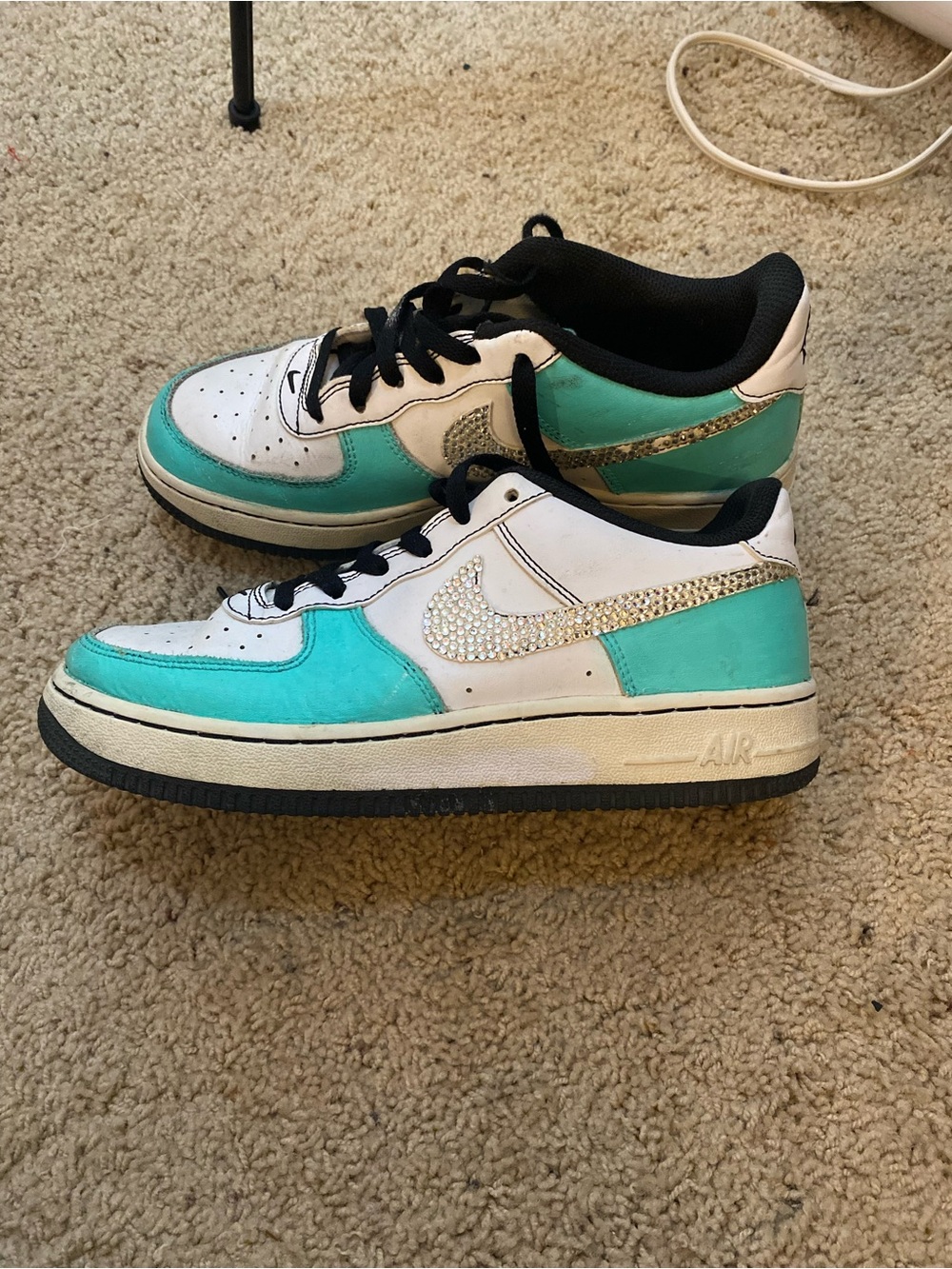 Nike Kids Low-Top Sneakers in White, Teal, and Black with Rhinestone Swoosh